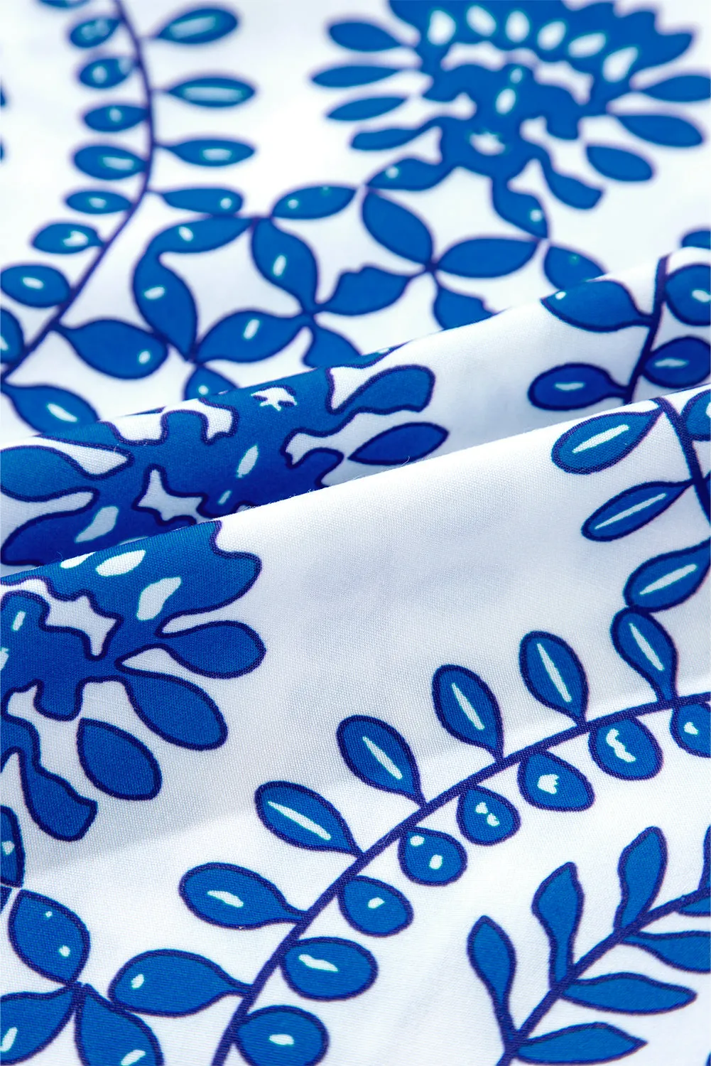 Chemise à col en V fendue à manches bouffantes et imprimé géométrique vintage bleu ciel